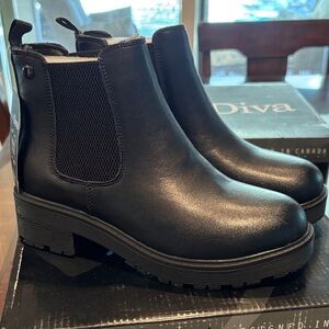 Sleek Black leather water resistant Ankle Boots